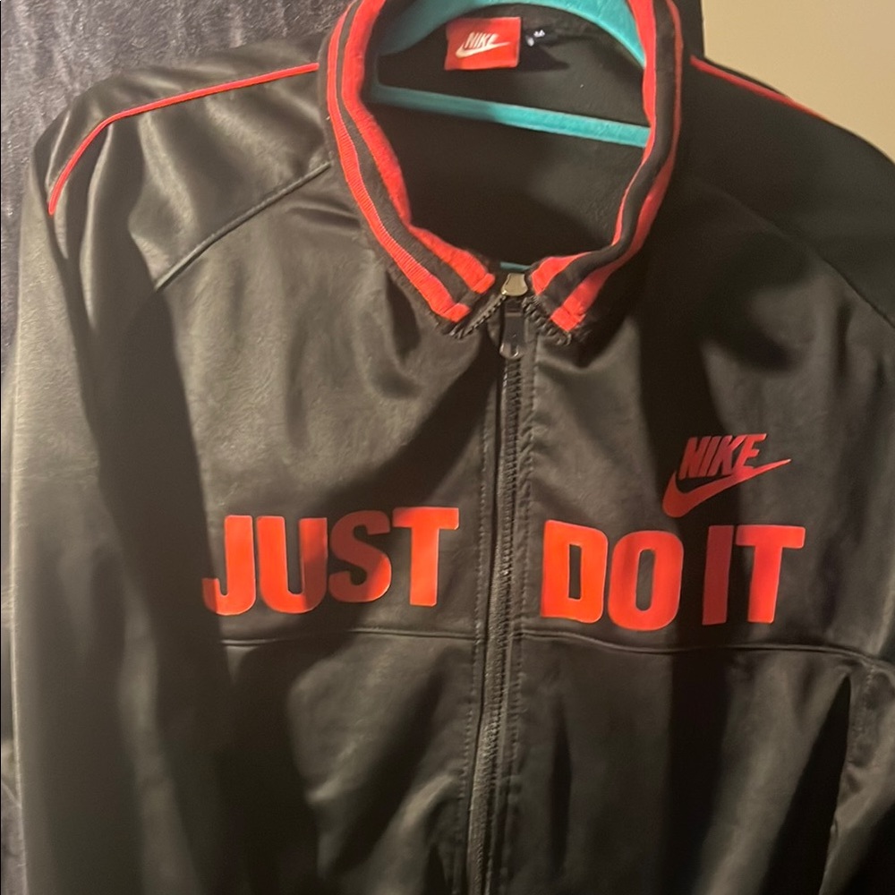 Nike Red and Black Lightweight Jacket with Bold Slogan